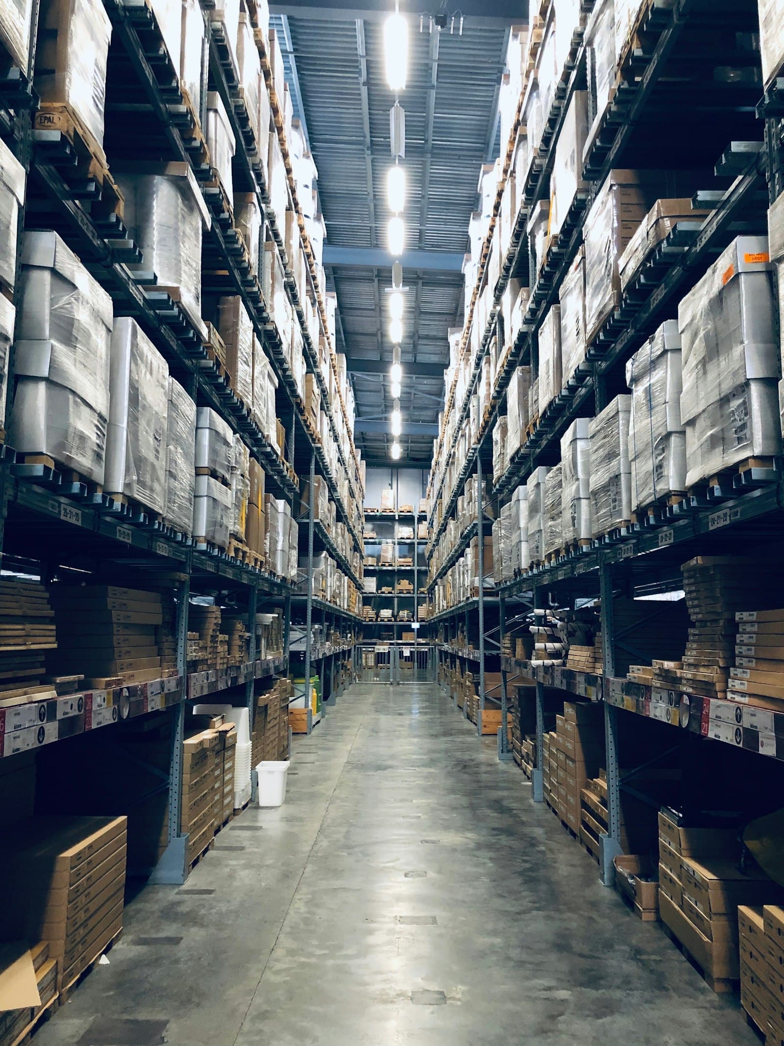 Machinery crated and racked in the New Delhi warehouse